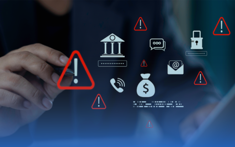 Imagem com tons azuis em que a mão de um profissional interage com ícones representando alertas para golpes financeiros.